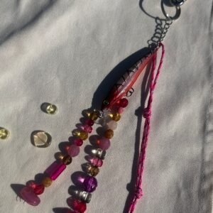 red rainbow fishing lure bag charm